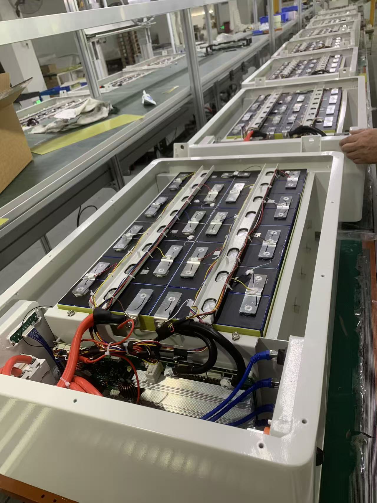 Battery pack production line — modules under assembly